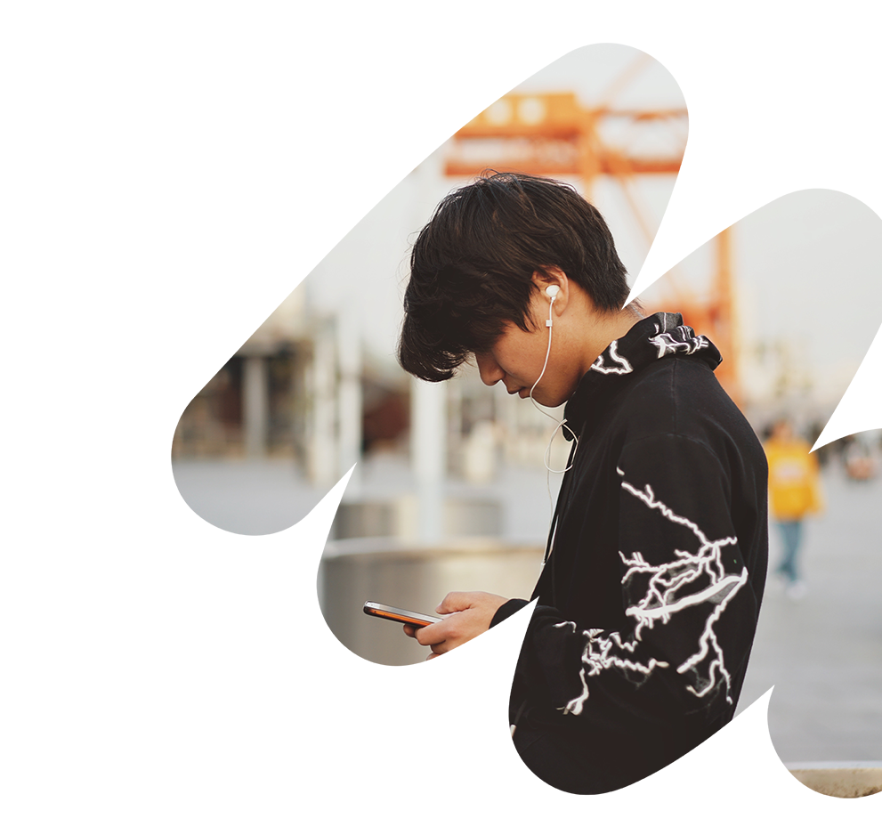 Young man in black hoodie with white lightning patterns,